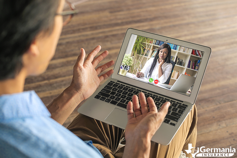 Video conference with insurance agent asking umbrella insurance questions