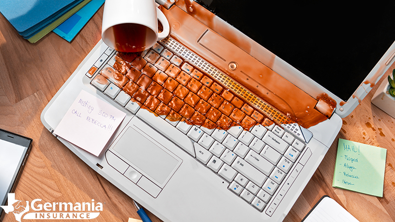 8-reasons-you-need-cloud-storage A ruined computer covered in spilled coffee emphasising the need for cloud storage.