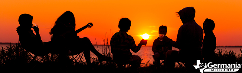 Sunset silhouette of people camping in Texas