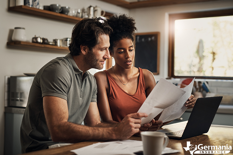 A couple learning about decreasing term life insurance policies