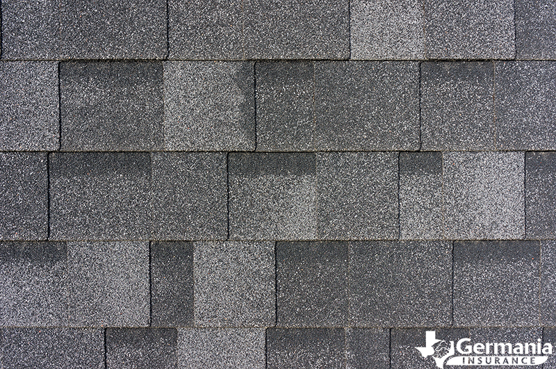 Architectural asphalt shingles, demonstrating the different types of roof shingles.