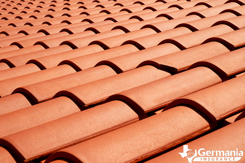 Clay tile shingles, demonstrating the different types of roof shingles.