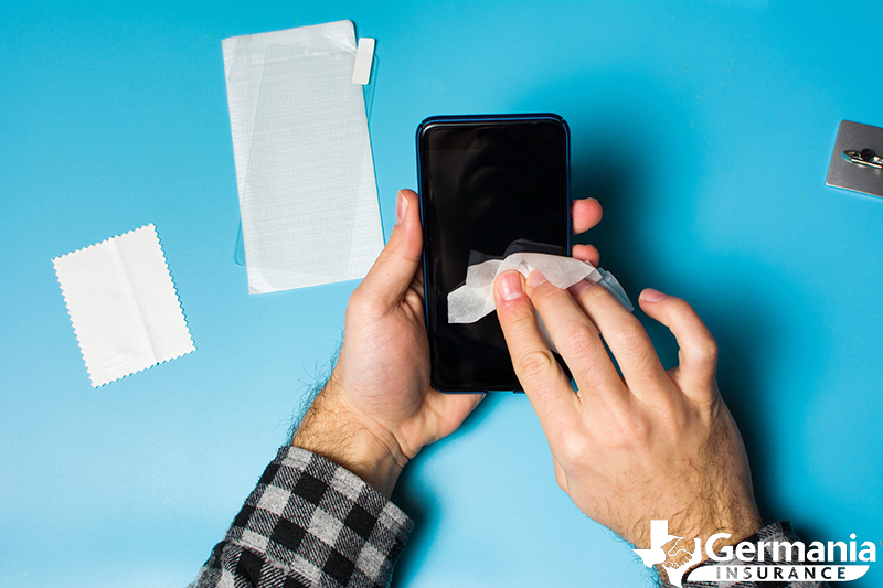 Safely disinfecting electronics with isopropyl alcohol wipes.