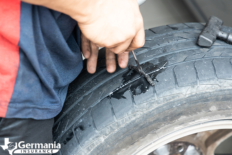 Fixing a flat tire with a tire plug kit