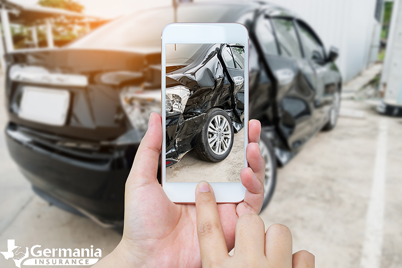 Using a mobile insurance app to go through the claims process. 