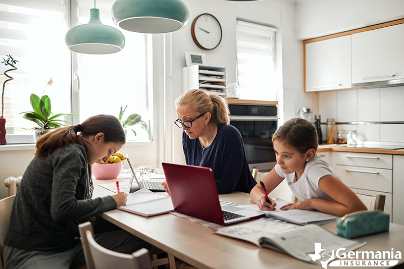 Several children safely doing schoolwork on the internet