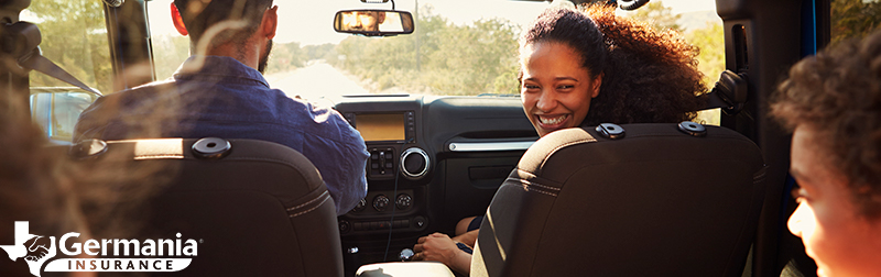 A Texas family in their car, protected by auto insurance