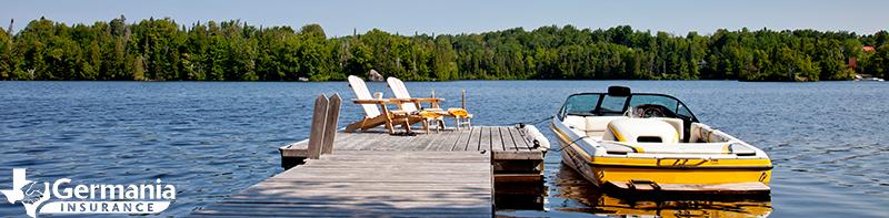 A boat tied to a dock, protected by boat insurance. 