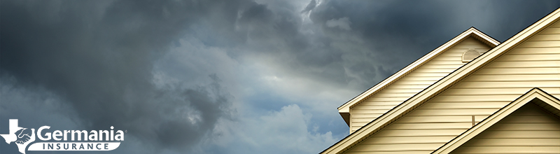 A tornado forming above a home during tornado season