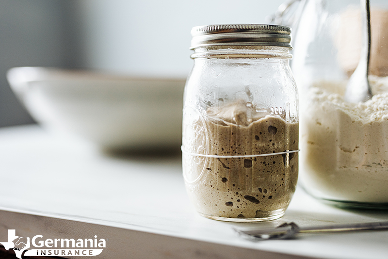 A jar of leftover sourdough starter discard